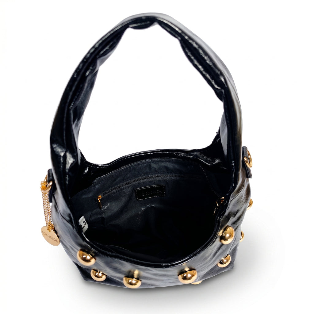 Borsa hobo Coconuda nera ecopelle verniciata con borchie dorate - vista interno aperto