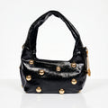 Borsa hobo Coconuda nera ecopelle con borchie sferiche dorate - vista laterale