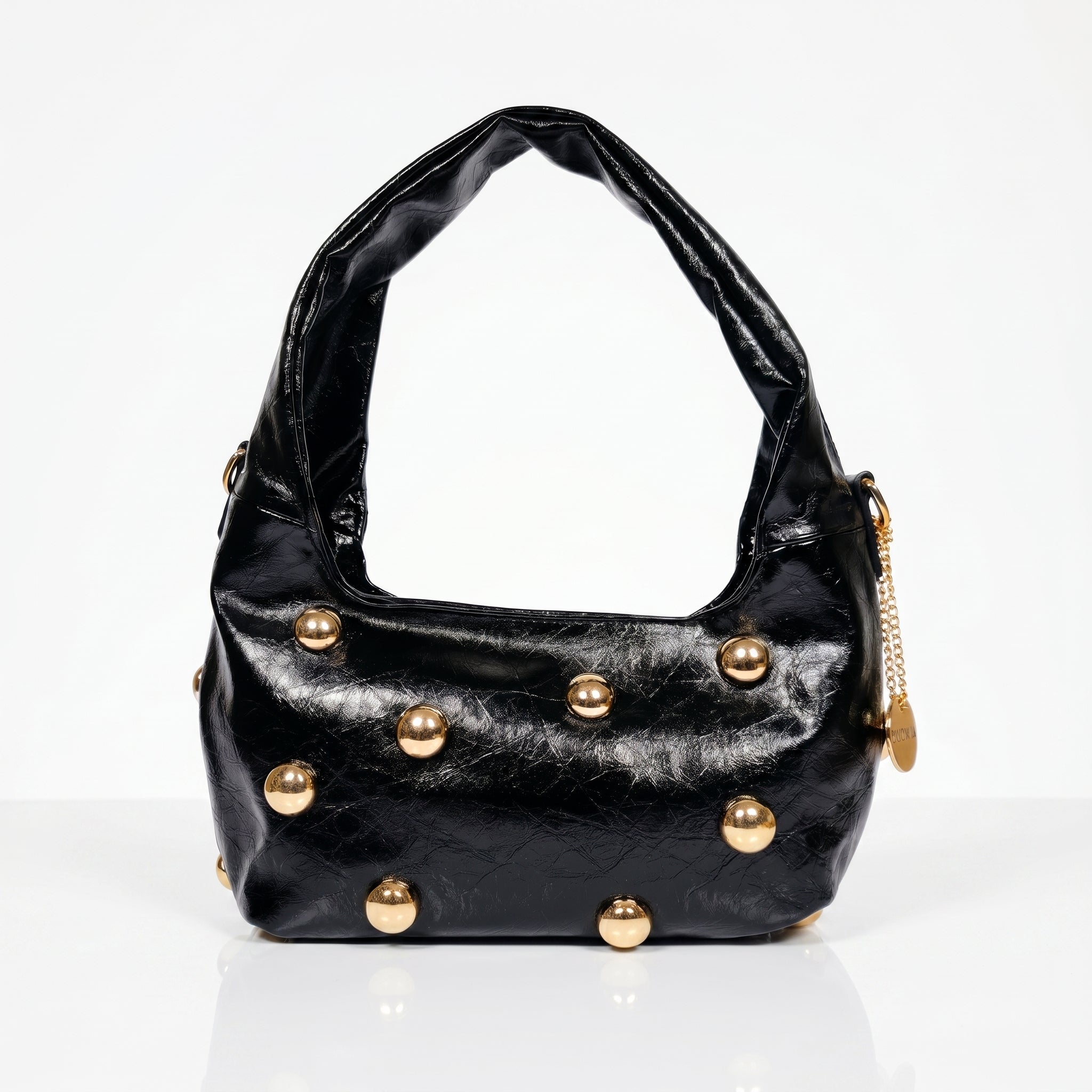 Borsa hobo Coconuda nera ecopelle con borchie sferiche dorate - vista laterale