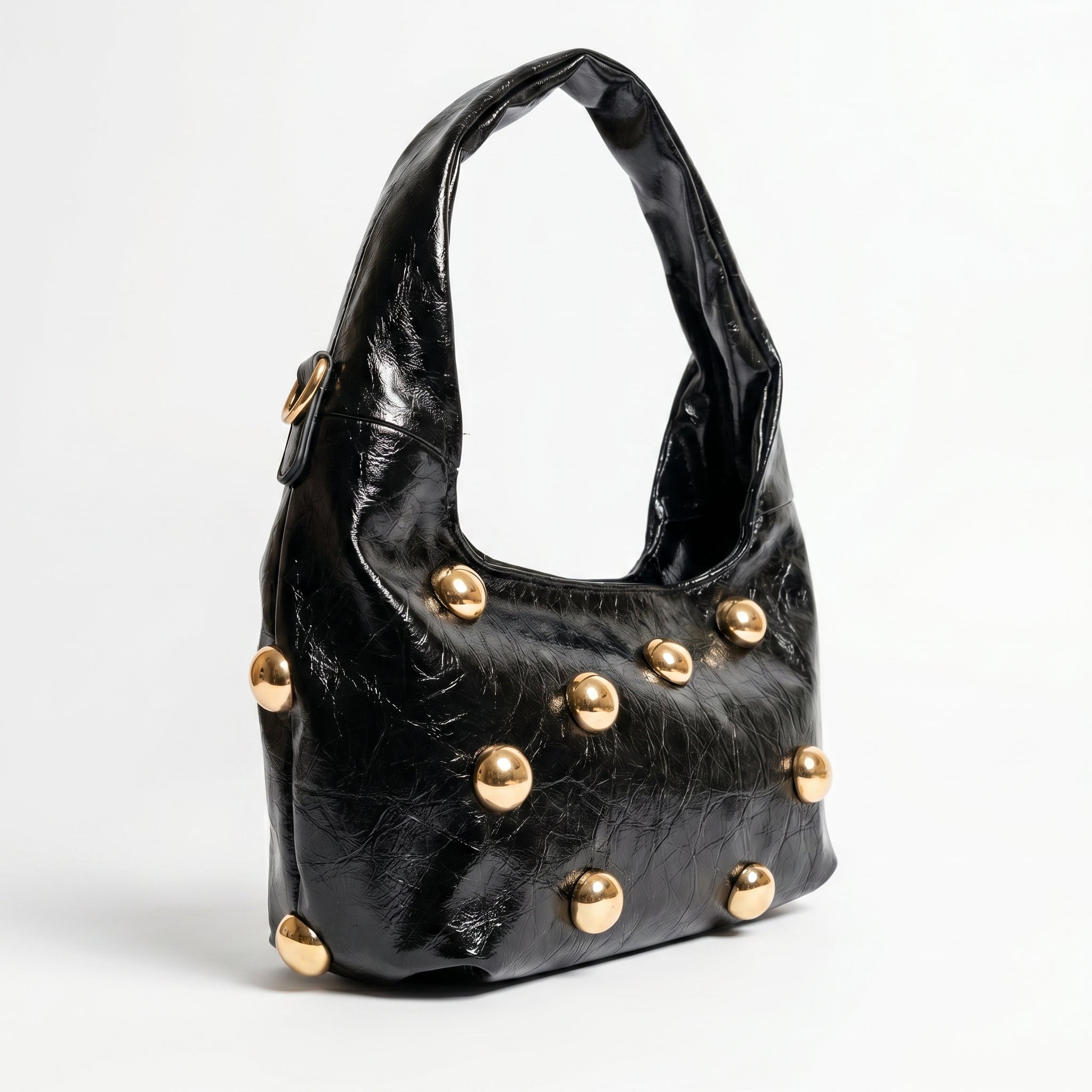 Borsa hobo Coconuda nera con borchie oversize dorate - dettaglio