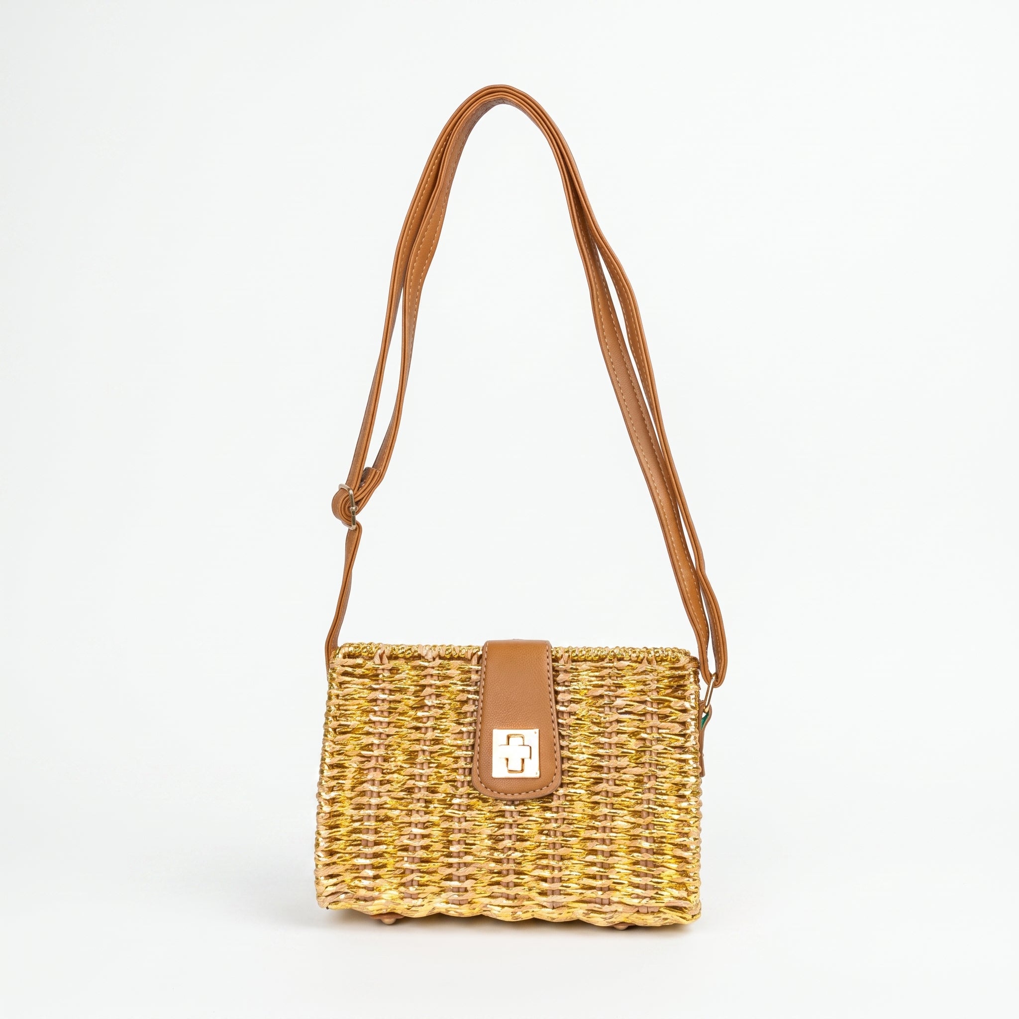 Woven handbag with a brown strap on a white background