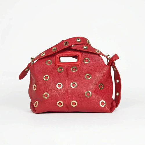 Stile Donna borsa a spalla ecopelle rossa con occhielli circolari dorati donna – vista frontale