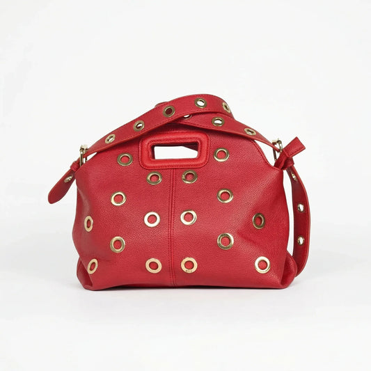 Stile Donna borsa a spalla ecopelle rossa con occhielli circolari dorati donna – vista frontale