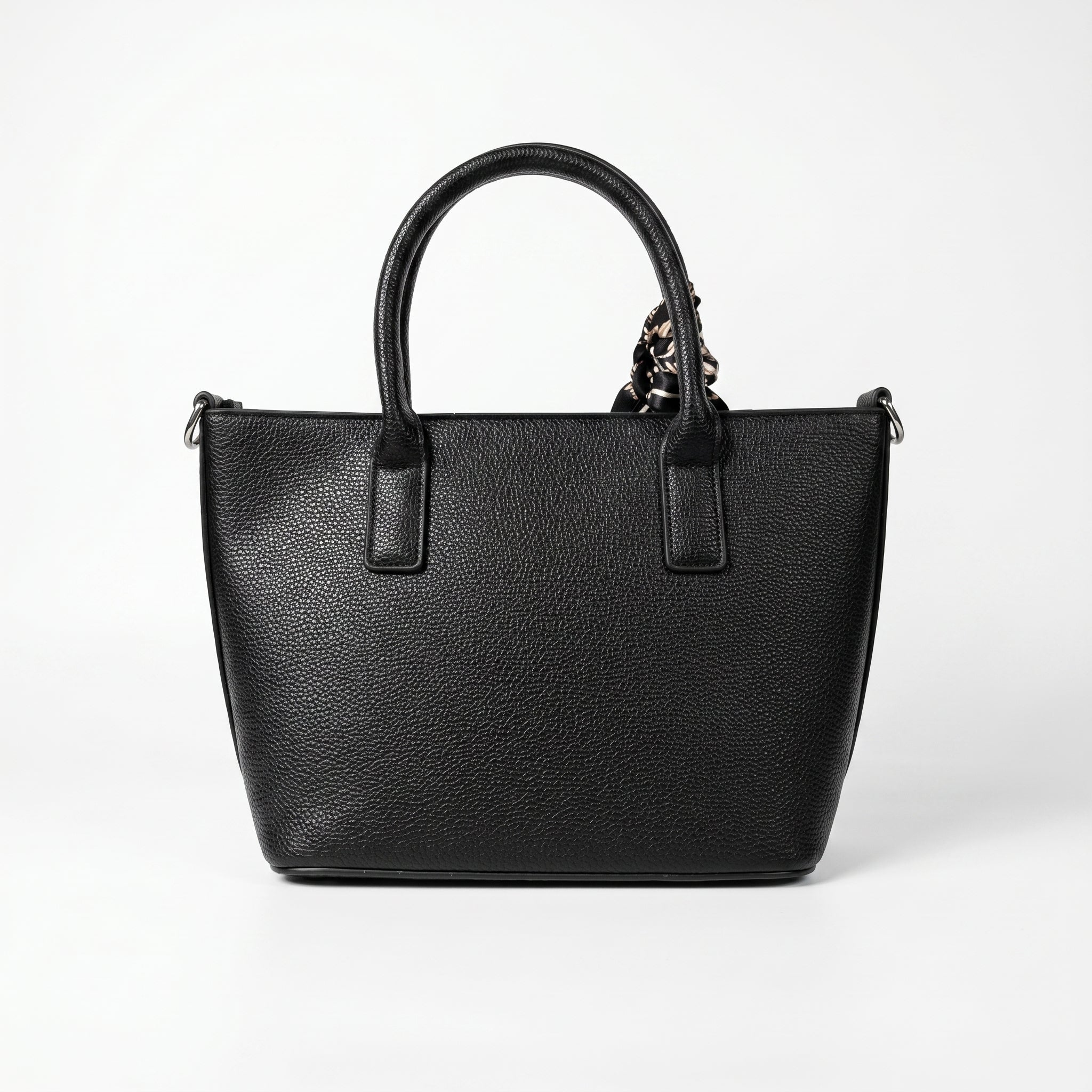 Black handbag on a white background