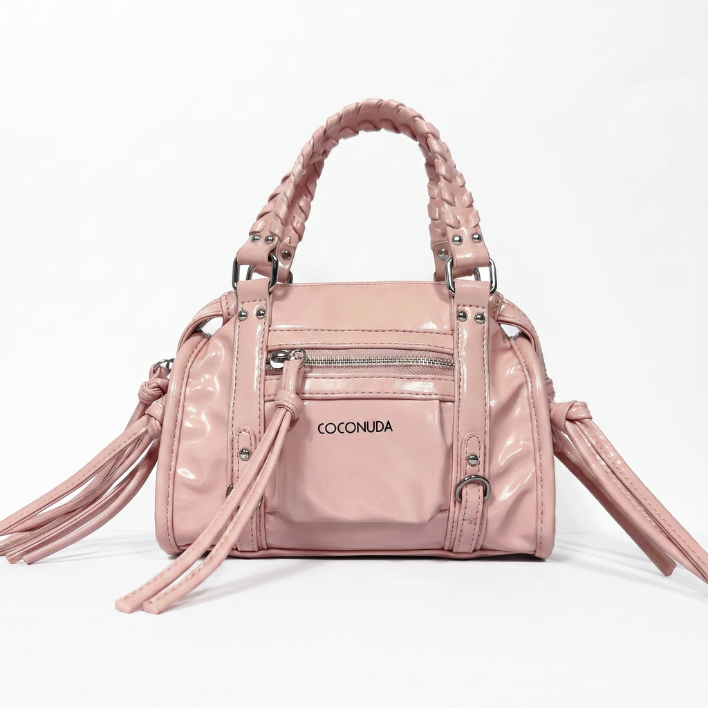 Mini bauletto Coconuda rosa cipria ecopelle verniciata con manici intrecciati - vista frontale