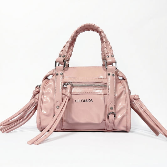 Mini bauletto Coconuda rosa cipria ecopelle verniciata con manici intrecciati - vista frontale