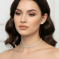 Stile Donna parure collana oro pietre rotonde con orecchini – vista laterale
