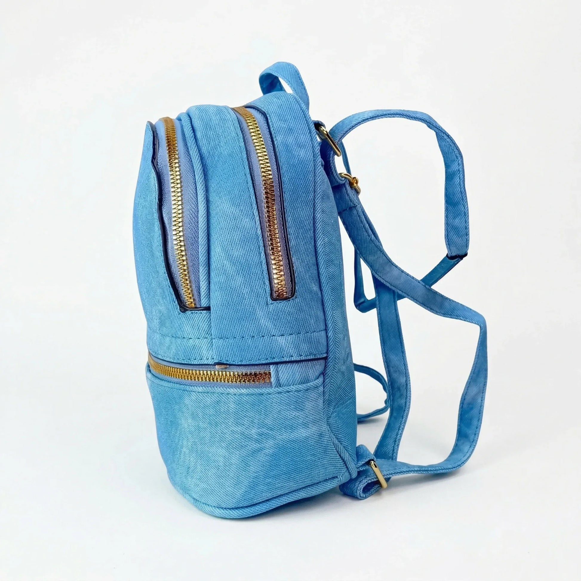 Zaino Mini Denim Blu Con Zip Oro | Vista laterale | denim | Blu
