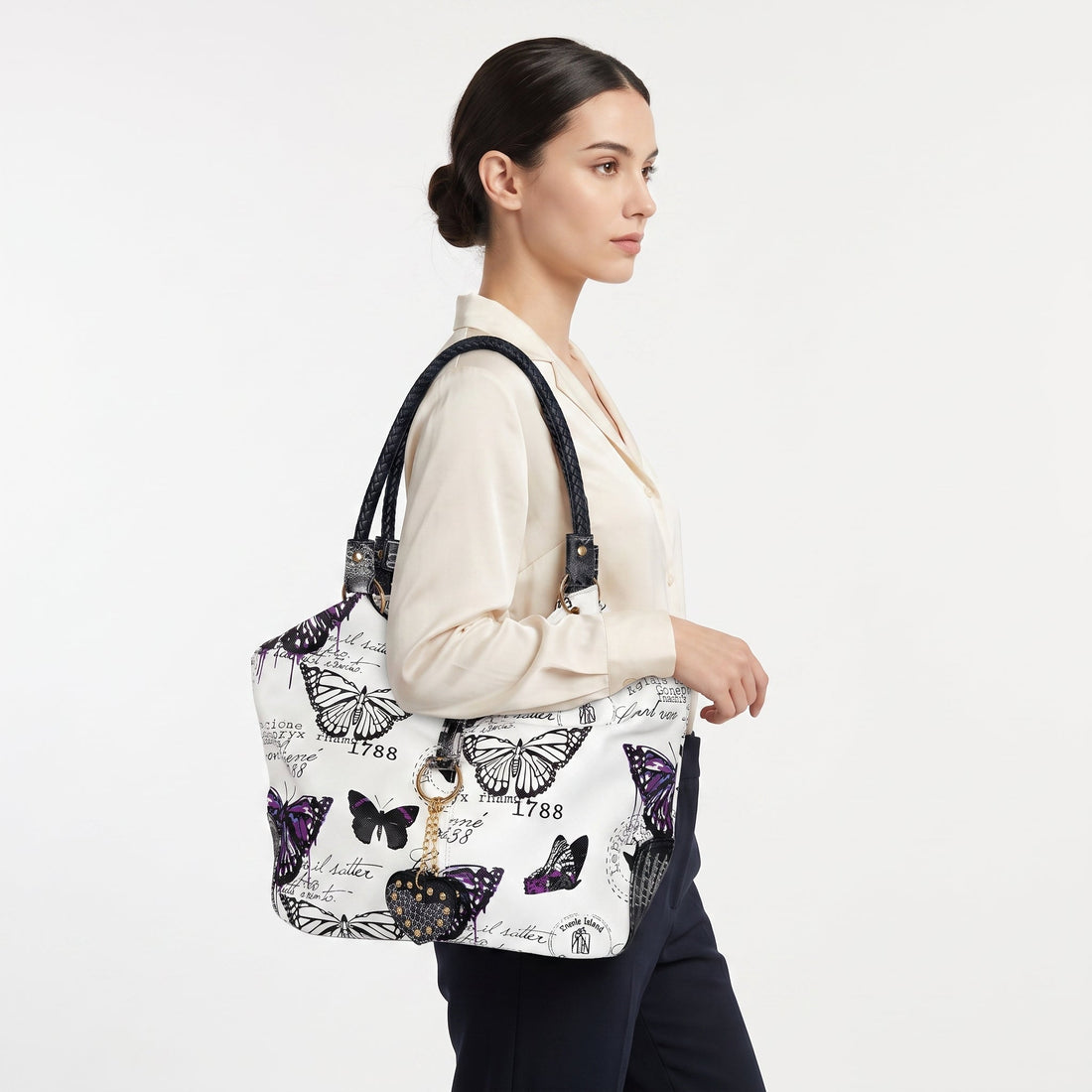 Borsa Adelina a Mano in Canvas Farfalle con Manici Intrecciati e Charm