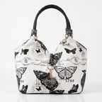 Borsa Adelina a Mano in Canvas Farfalle con Manici Intrecciati e Charm - Stile Donna Bags