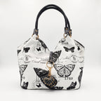 Borsa Adelina a Mano in Canvas Farfalle con Manici Intrecciati e Charm - Stile Donna Bags