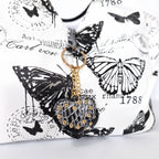 Borsa Adelina a Mano in Canvas Farfalle con Manici Intrecciati e Charm - Stile Donna Bags