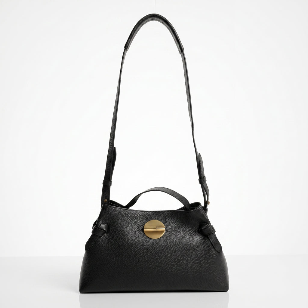 Borsa Livia in Vera Pelle Martellata Nera con Chiusura Disco Malachite