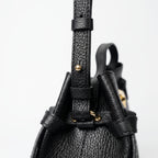 Borsa Livia in Vera Pelle Martellata Nera con Chiusura Disco Malachite