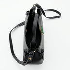 Borsa Livia in Vera Pelle Martellata Nera con Chiusura Disco Malachite