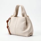 Borsa a Mano Coconuda in Ecopelle Goffrata con Charm Decorativo e Tracolla - Borse a Mano - Coconuda